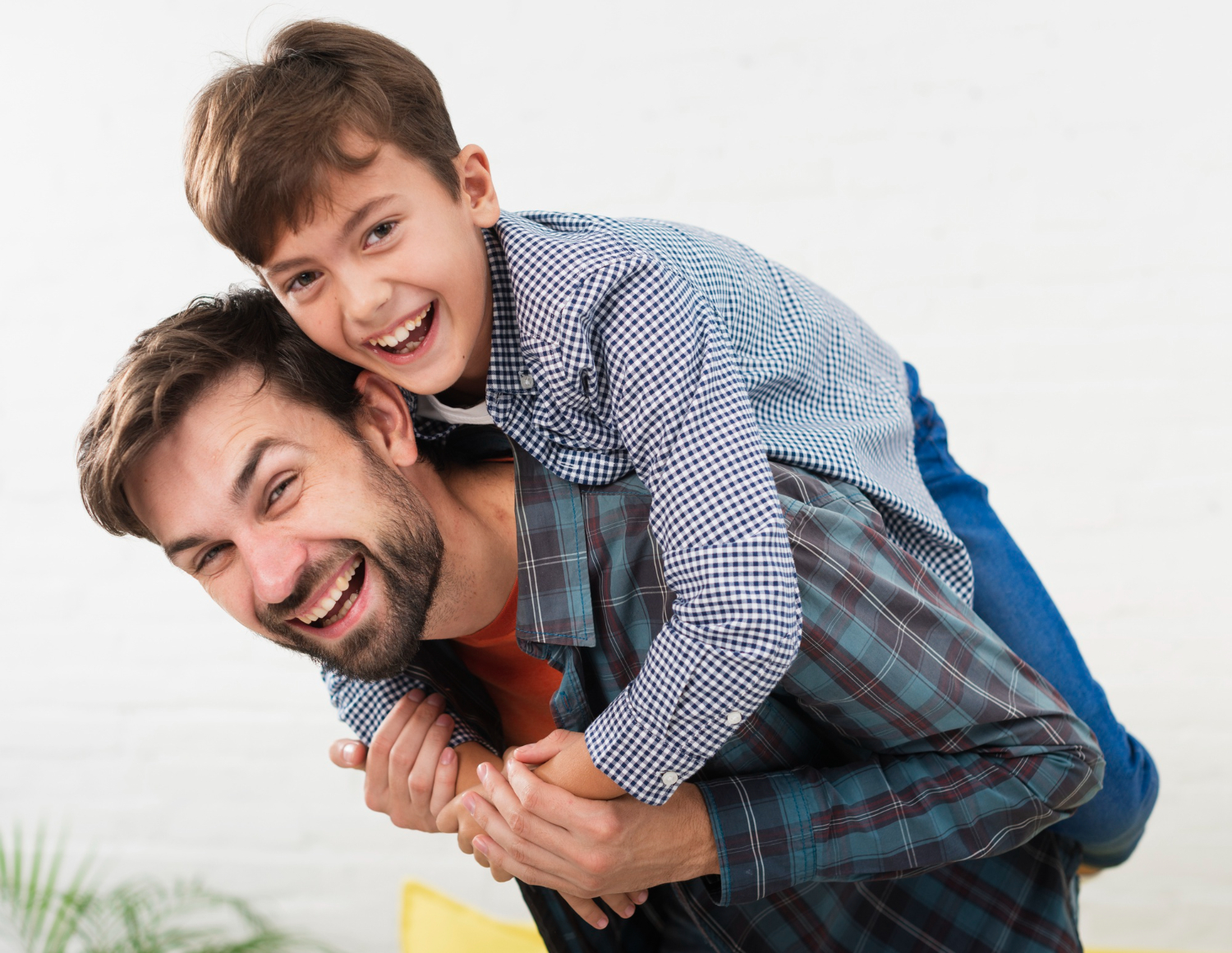 portrait-of-happy-father-embraced-by-his-son portrait-of-happy-father-embraced-by-his-son